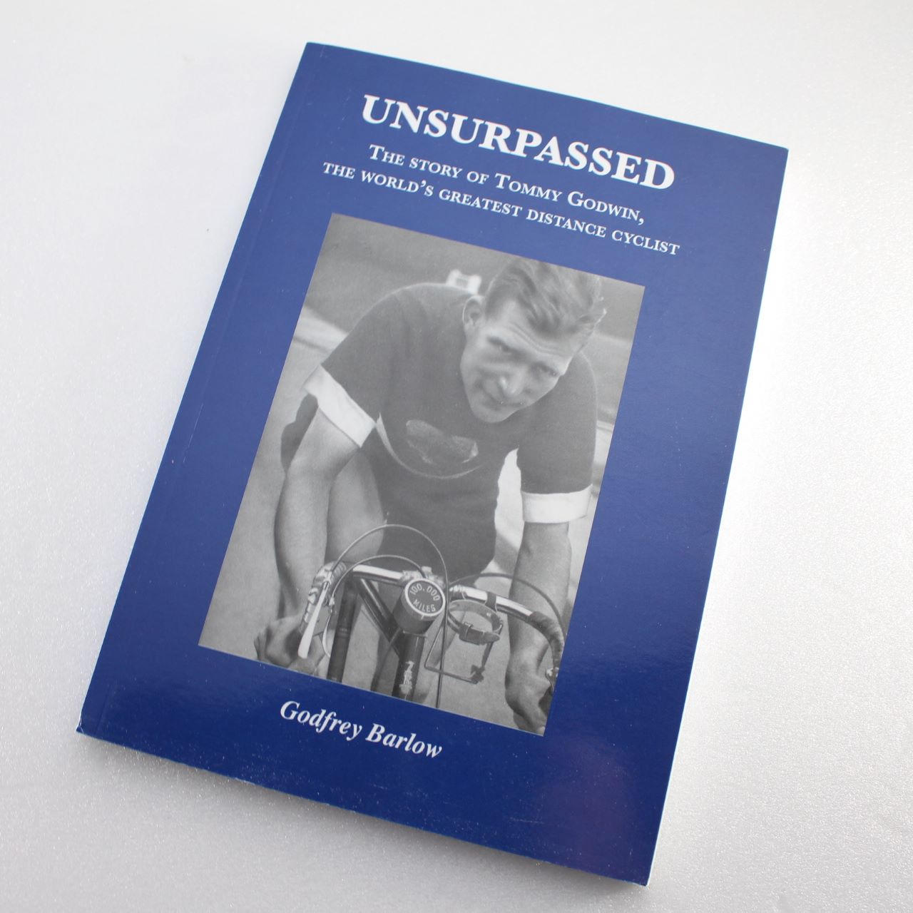 Unsurpassed: The Story of Tommy Godwin the World’s Greatest Distance Cyclist by Godfrey Barlow  ISBN: 9781874739623