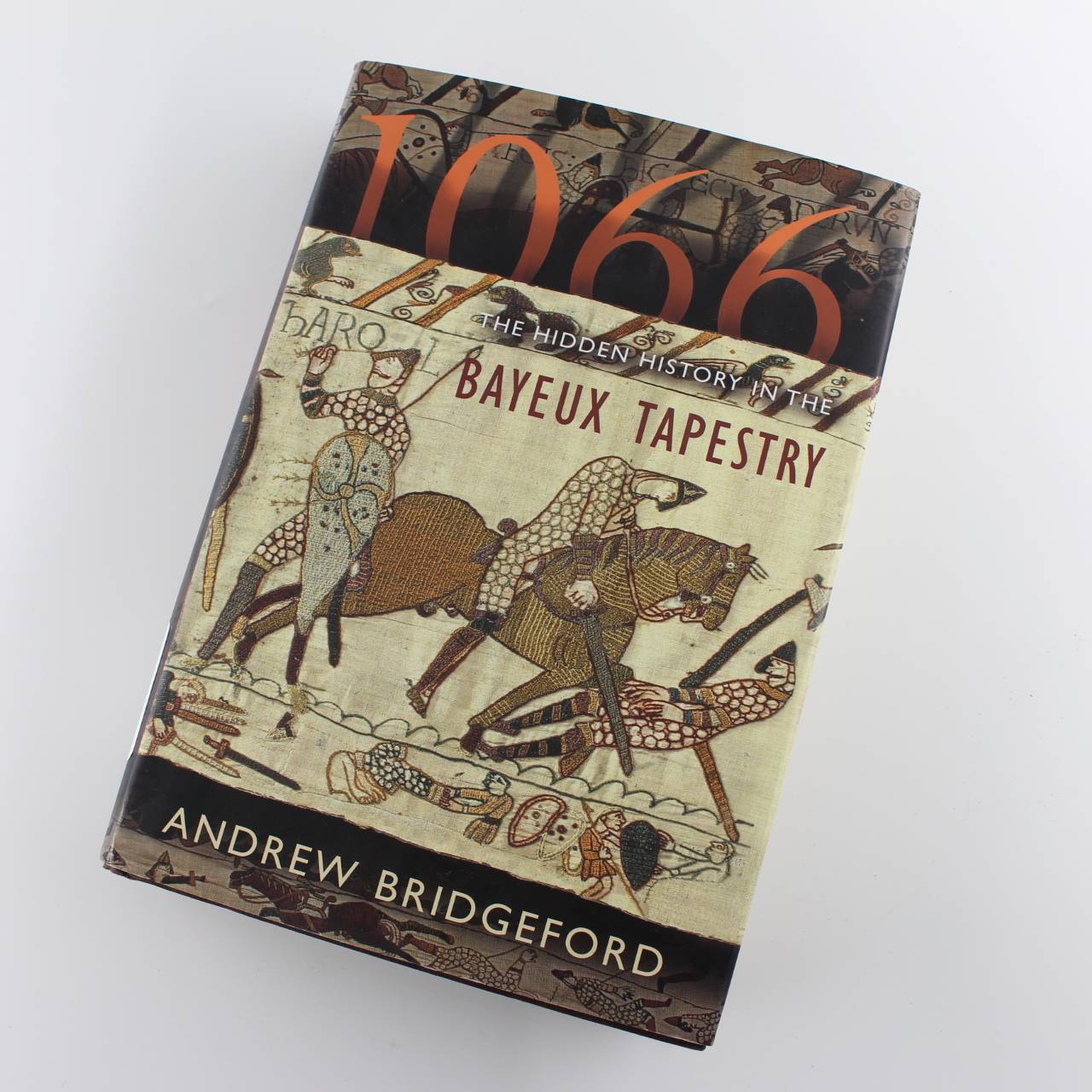 1066: The Hidden History of the Bayeux Tapestry book by Andrew Bridgeford  ISBN: 9780802714503