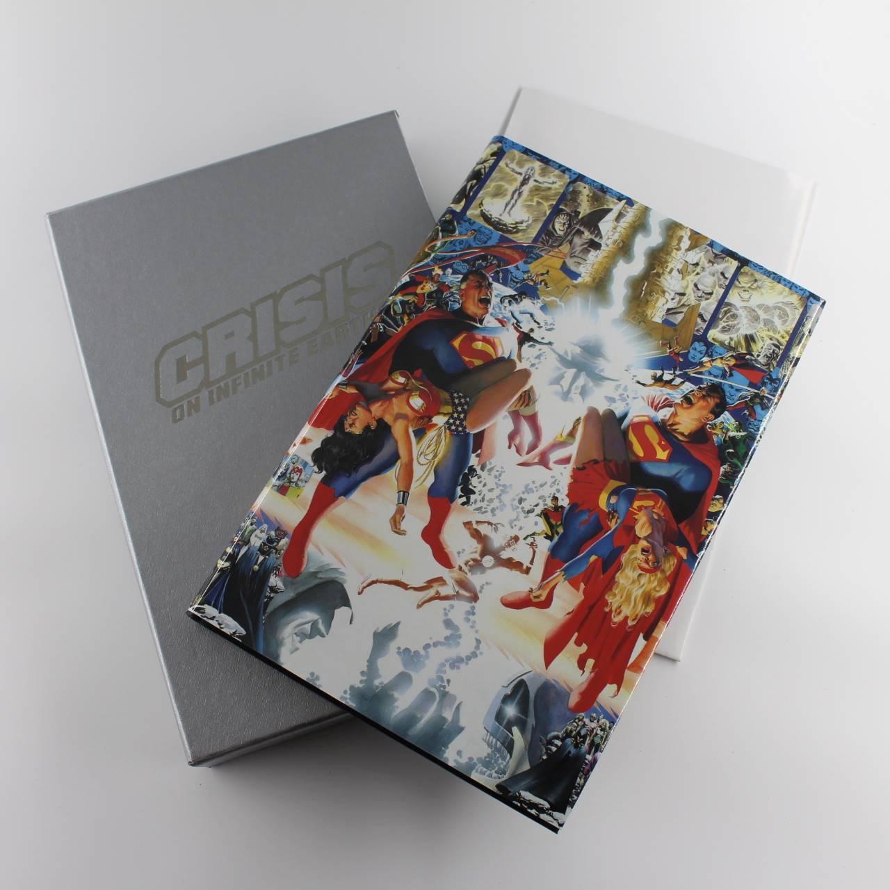 Crisis on Infinite Earths slipcase with poster book by Marv Wolfman ISBN: 9781563894343