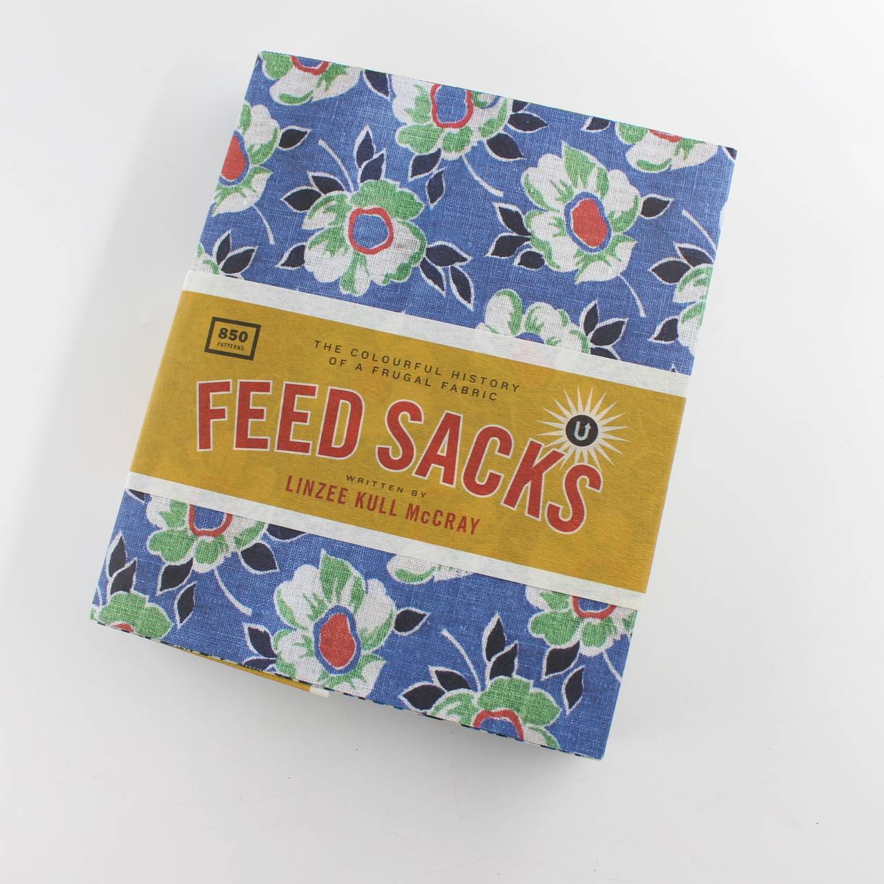 Feed Sacks: The Colourful History of a Frugal Fabric book by Linzee Kull McCray   ISBN: 9781683560425