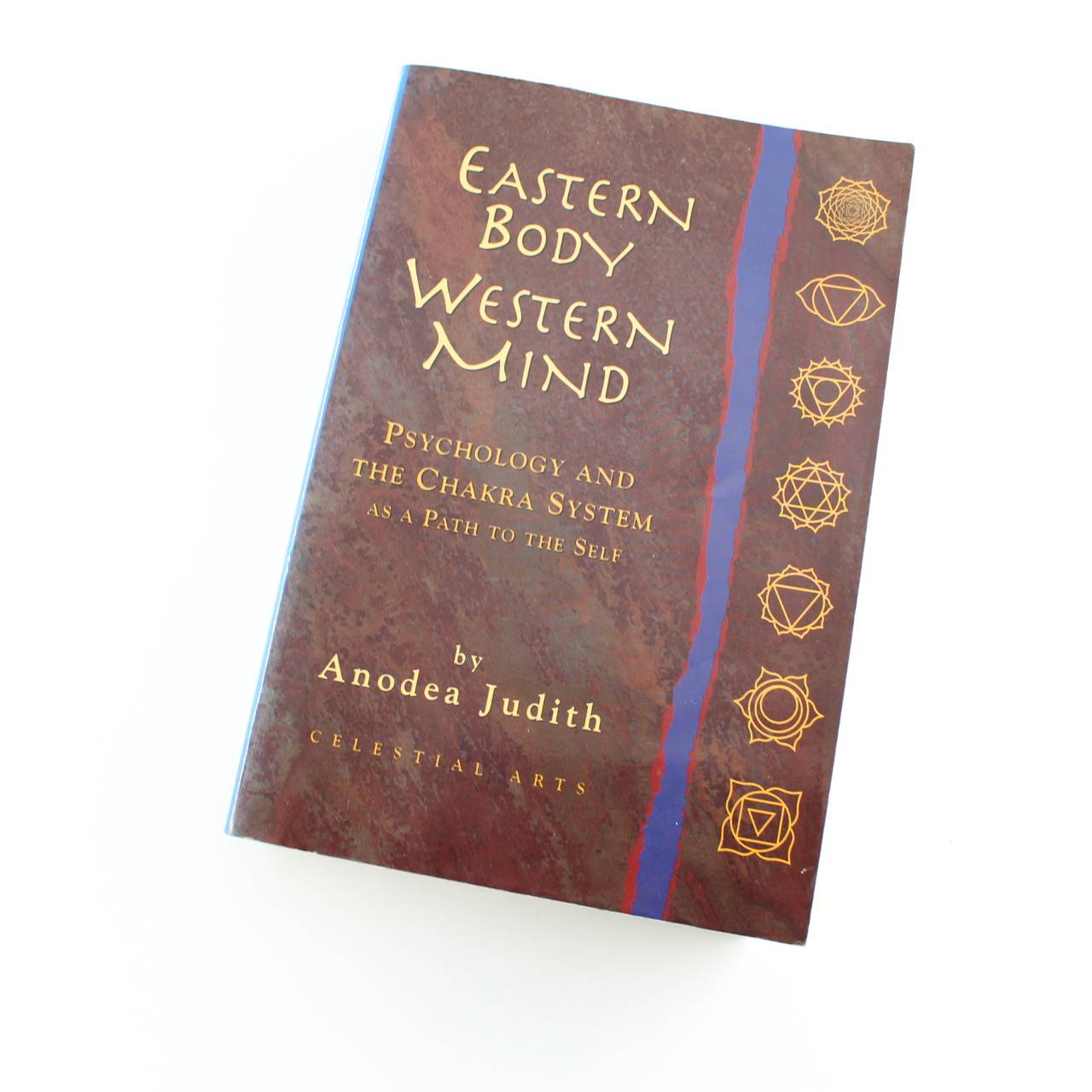 Eastern Body Western Mind: Psychology of the Chakra System as Path to the Self book by Anodea Judith PhD  ISBN: 9780890878156